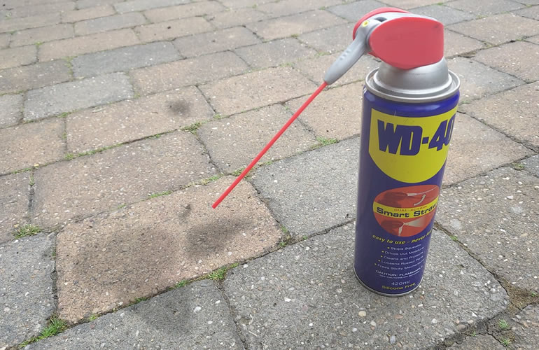 WD40 and oil stain on driveway